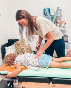 Chiropractor Orlando FL Kasey Johnson Adjusting Child