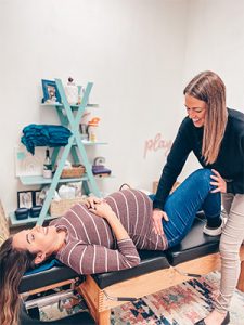 Chiropractor Orlando FL Kasey Johnson Adjusting Patient