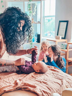 Chiropractor Orlando FL Scherina Alli With Infant Chiropractor Orlando FL Scherina Alli With Infant