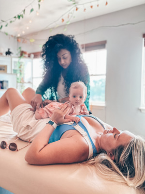 Chiropractor Orlando FL Scherina Alli Adjusting Infant With Mom Chiropractor Orlando FL Scherina Alli Adjusting Infant With Mom