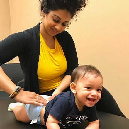 Chiropractor Orlando FL Scherina Alli Adjusting Baby Chiropractor Orlando FL Scherina Alli Adjusting Baby